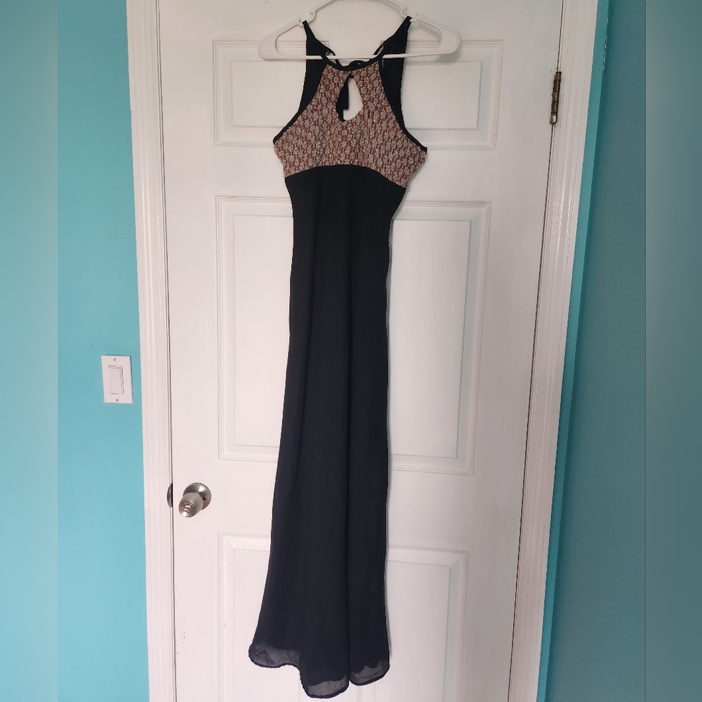 Thea Dora size 4 black evening dress with red and silver shimmer bust